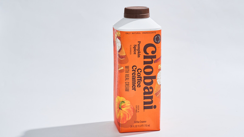 Chobani pumpkin spice creamer on table.