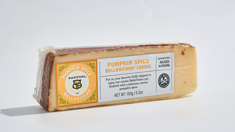 Sartori BellaVitano Pumpkin Spice Cheese on a table.