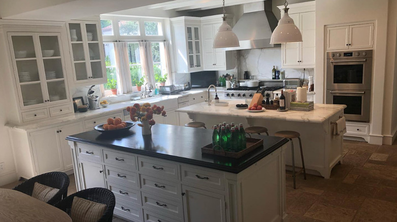 White kitchen with large island