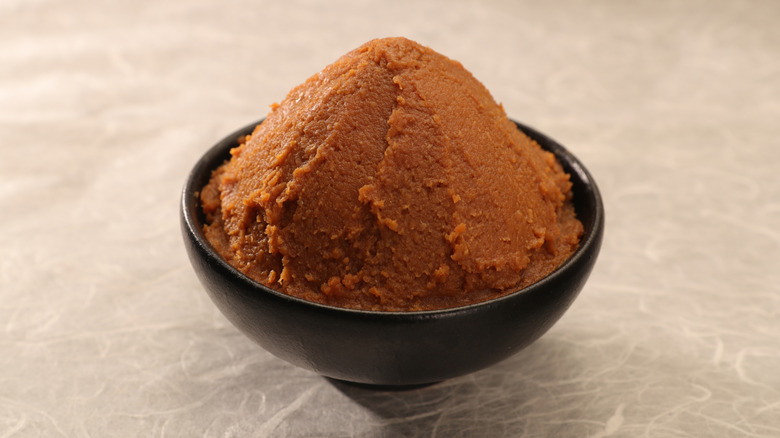 small black dish of miso paste