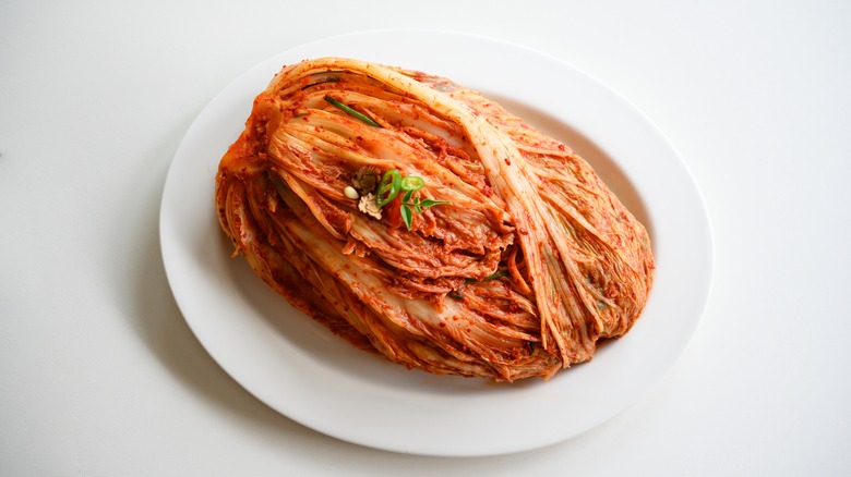 plate of kimchi on white background