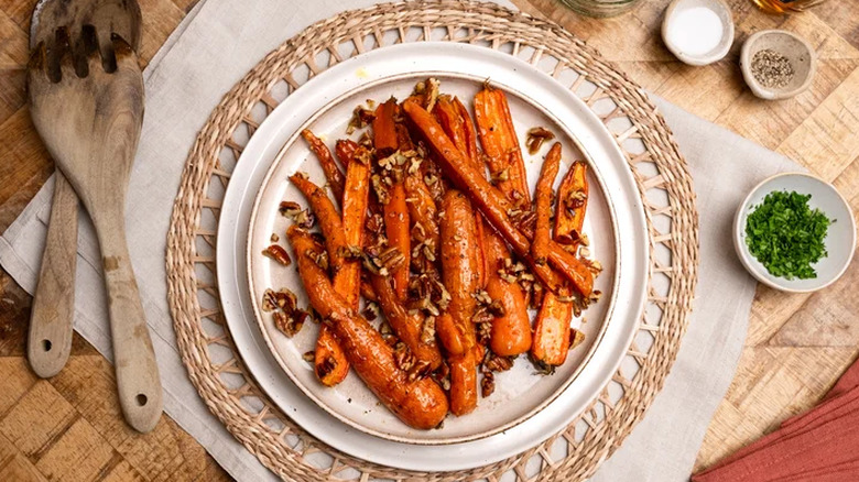 Maple carrots on a plate with nuts