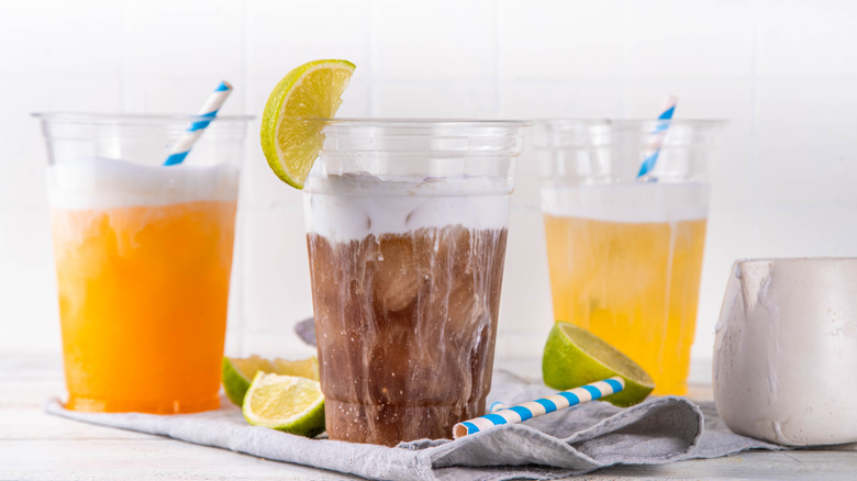 dirty soda mocktails in plastic cups