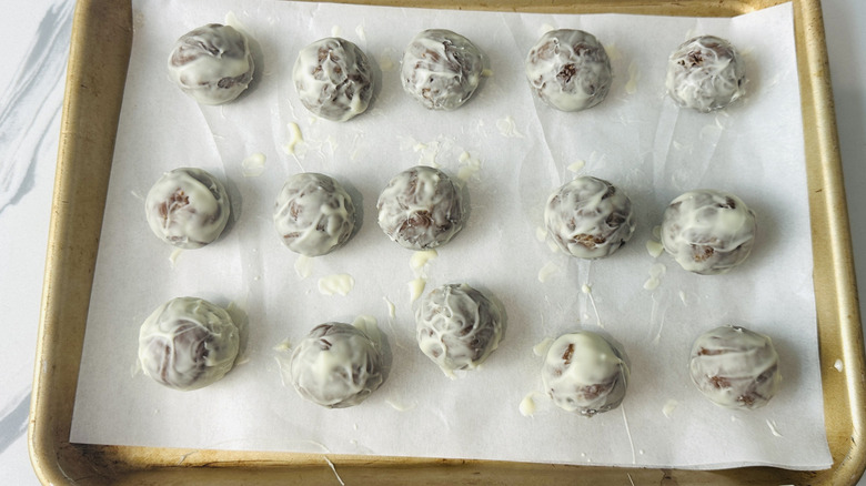 White chocolate coated pumpkin truffles