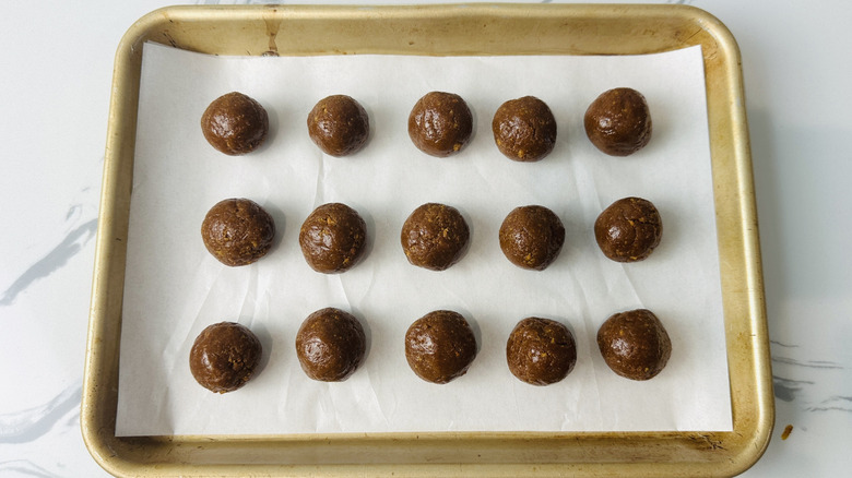 Pumpkin spice truffles on baking sheet