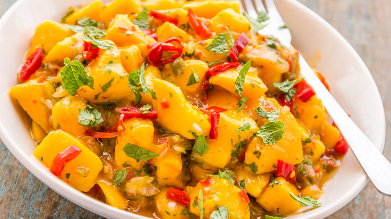 close up of a bowl of mango salsa