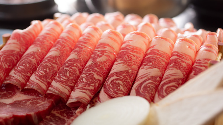 Rolled up thin cut brisket slices