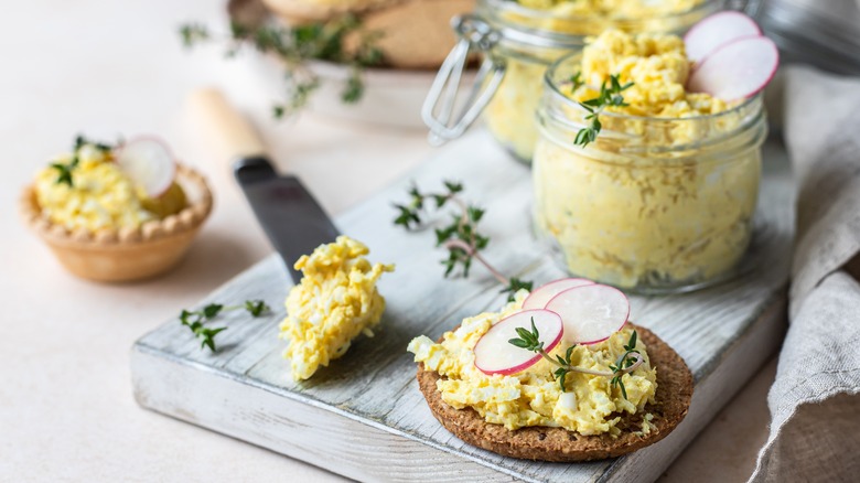 homemade egg salad spread on crackers 