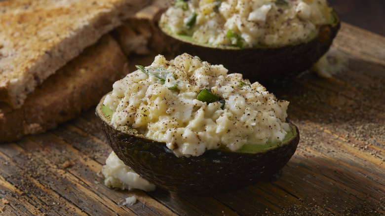 egg salad served in avocados 