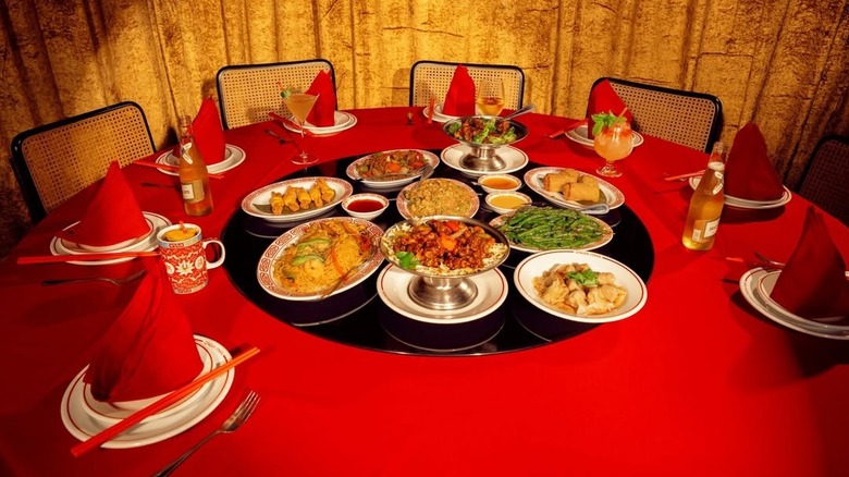 A table full of food at Genghis Cohen