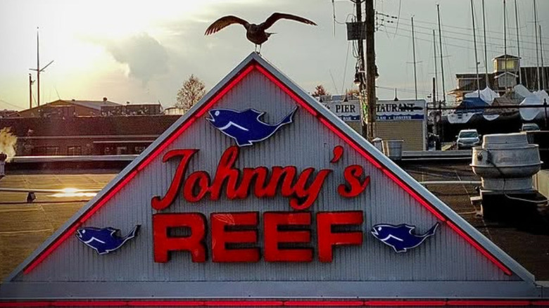 A paper plate of fried seafood on the waterfront at Johnny's Reef.