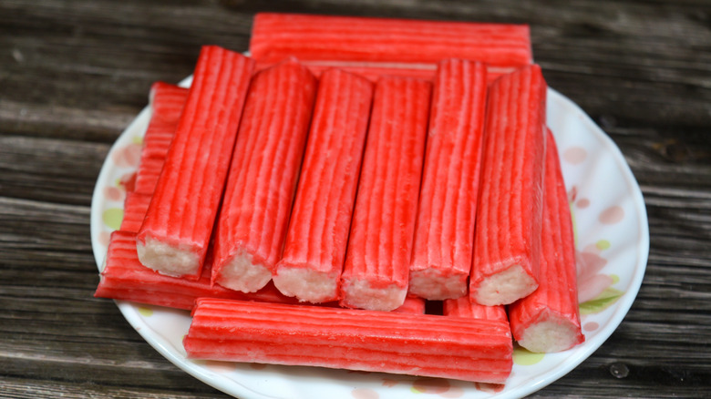Imitation crab meat stacked on a plate