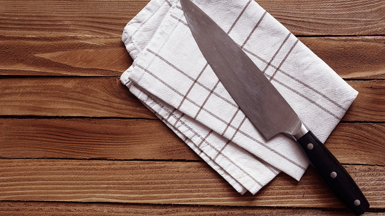 Chef's knife on cloth