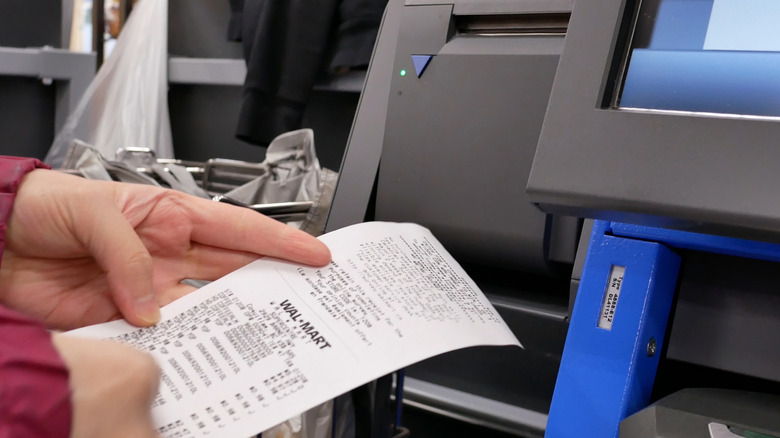 Walmart bill at the checkout counter