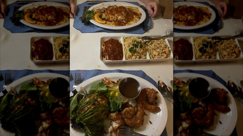 plates and dishes of Italian food on table with white cloth