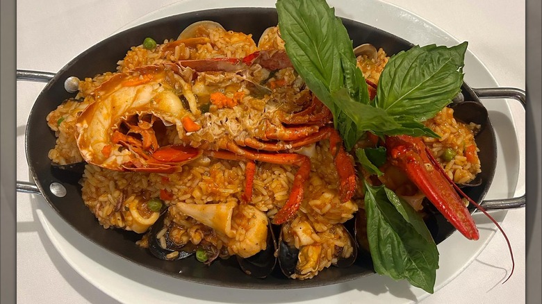 close-up of seafood and rice dish on table
