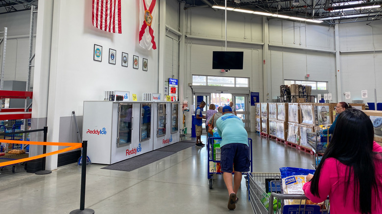 People getting checked at a Sam's Club exit