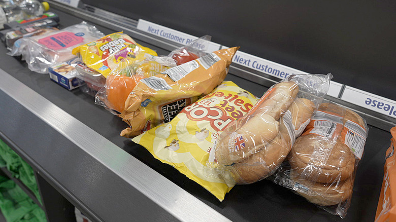 Groceries lining Aldi conveyer belt