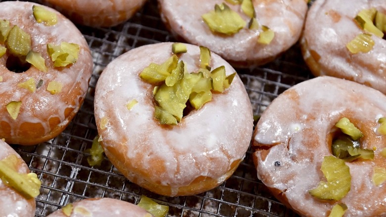 Donuts topped with chopped pickles
