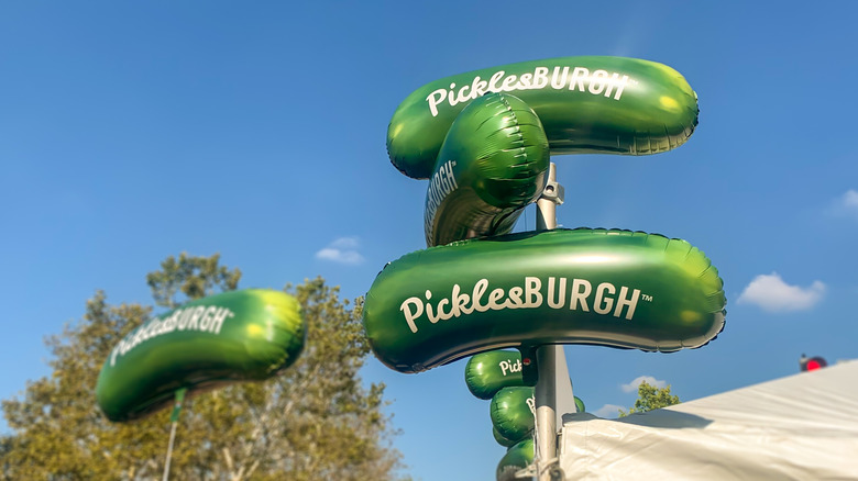 Picklesburgh branded mylar pickle-shaped balloons