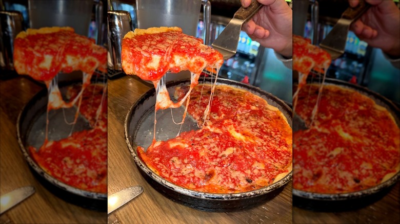 Person serving up a slice of Lou Malnati's deep dish pizza
