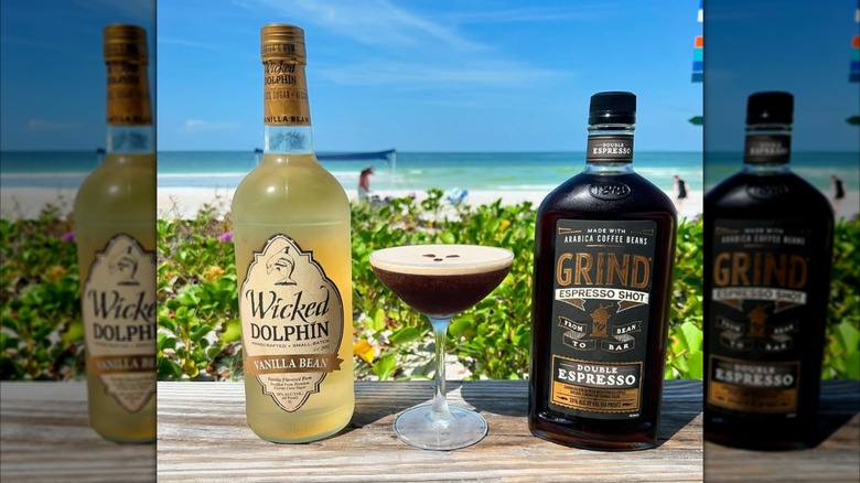 Grind double espresso rum and vodka on a table