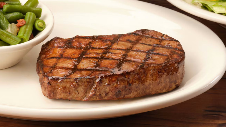 A sirloin steak on a plate at Texas Roadhouse