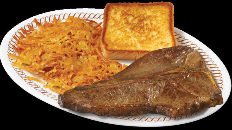 A T-bone steak with toast and hash browns at The Waffle House