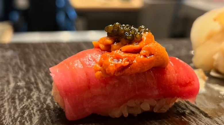 Colorfully garnished salmon tataki nigiri