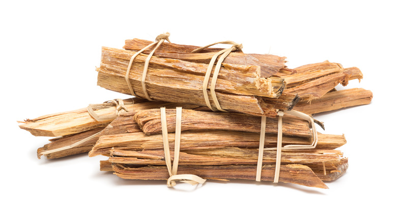 bundles of fatwood on white background
