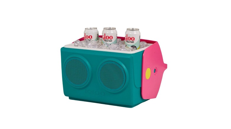 green and pink Igloo cooler with ice and drinks inside