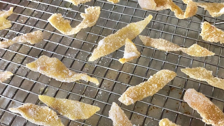 Candied lemon zest scattered on rack