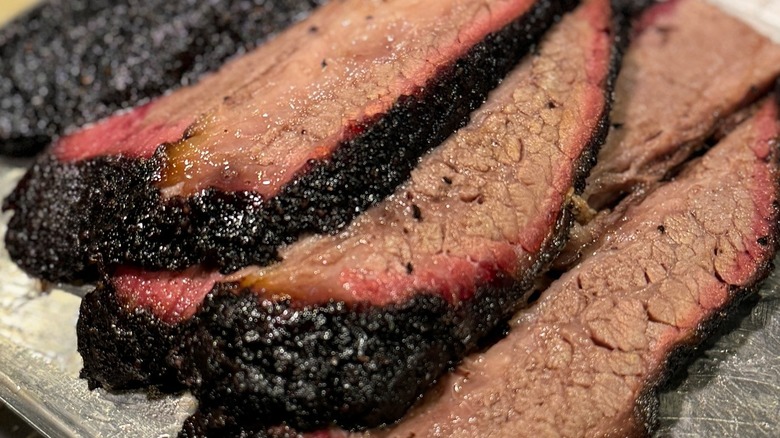 Perfectly sliced brisket on a tray