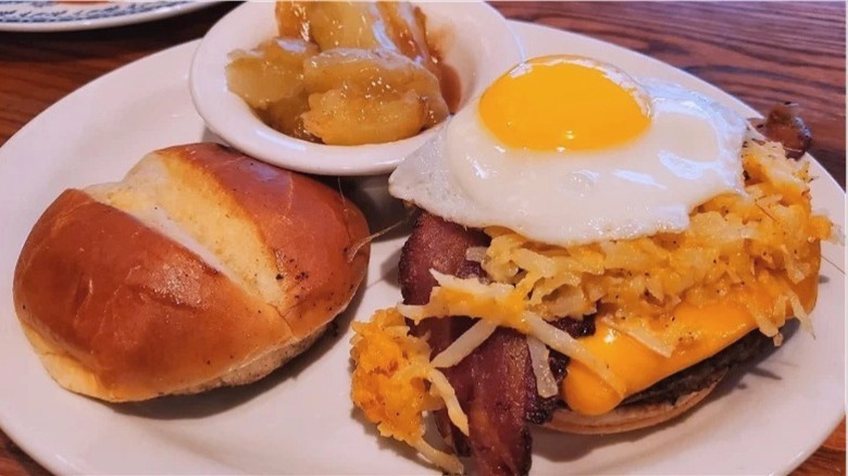 Cracker Barrel breakfast burger with a side of fried apples
