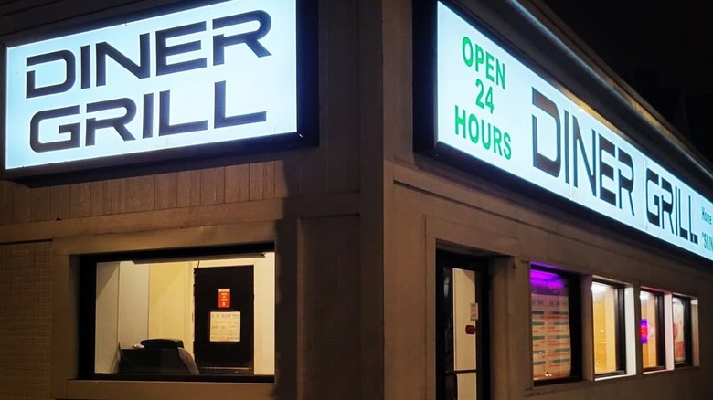 The facade of Diner Grill taken at night