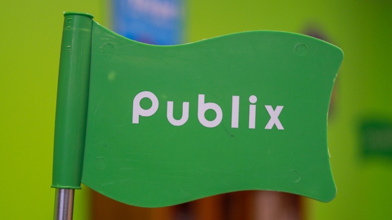 a plastic, green Publix flag
