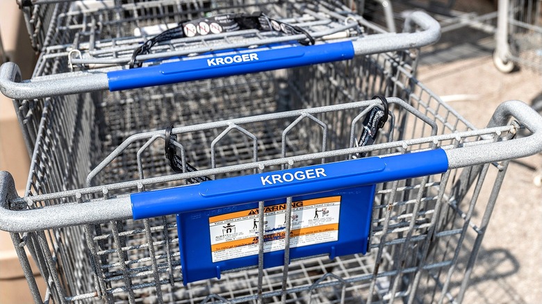Closeup of two Kroger shopping carts