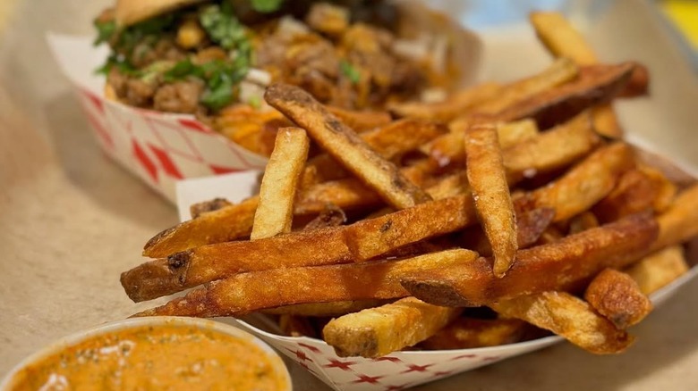 French fries on a plate from Saus in Somerville, MA