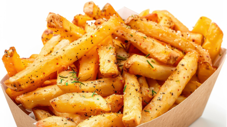 French fries on white background