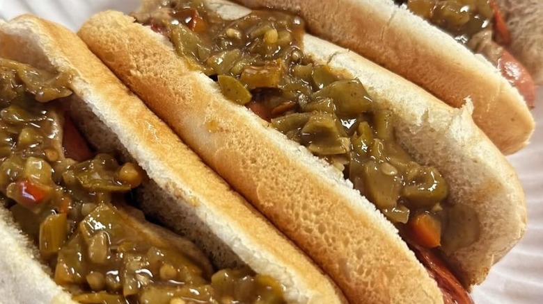 Three hot dogs with relish