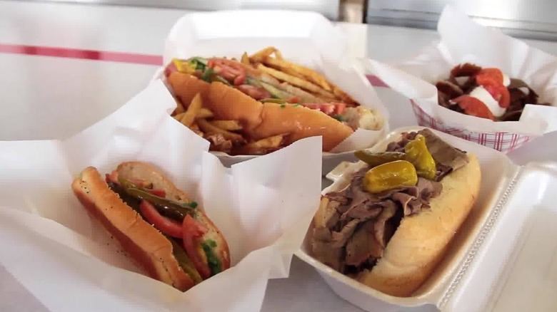 An assortment of sandwiches and hot dogs