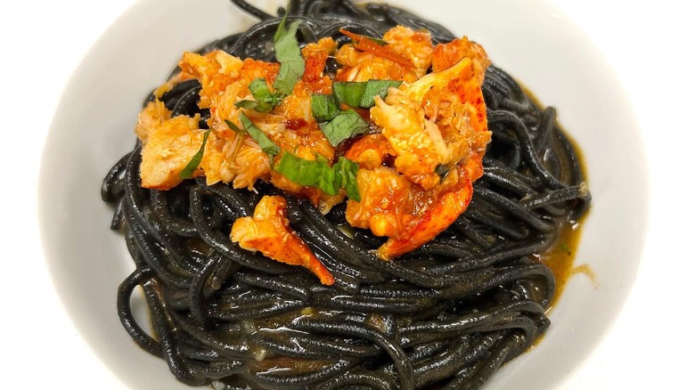 A plate of squid ink spaghetti with lobster at Il Pizzico in Rockville