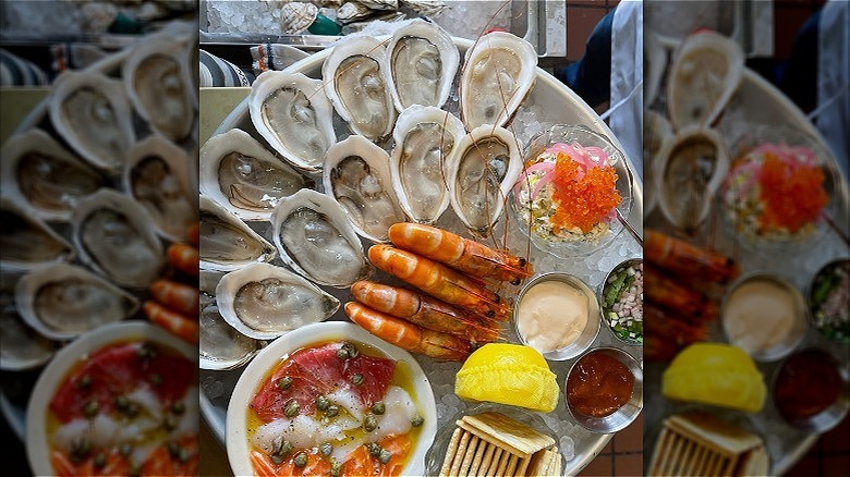 A plate of oysters, shrimp, caviar, and dips at Found Oyster