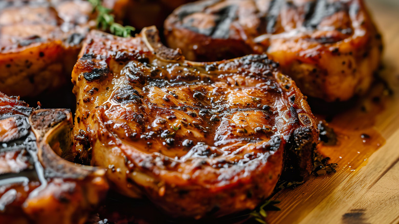 A perfectly marinated, glazed pork chop hot off the grill.