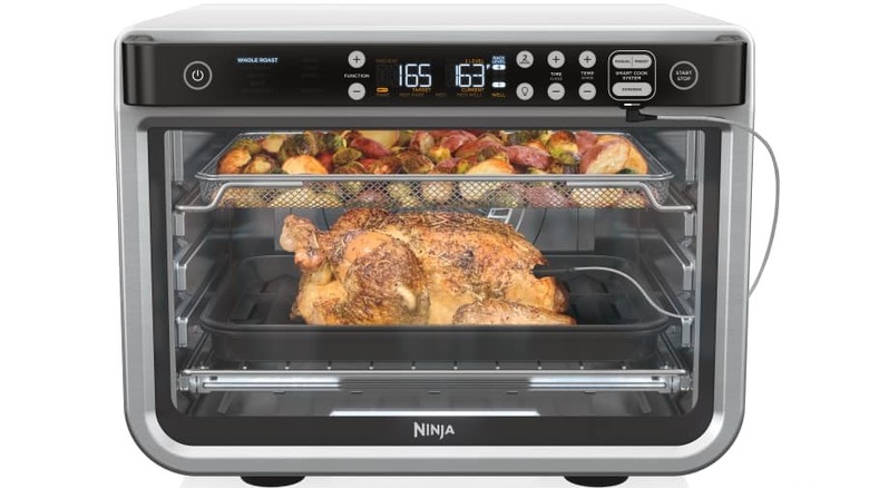 A Ninja Foodi Smart XL Pro Air Oven against a white background