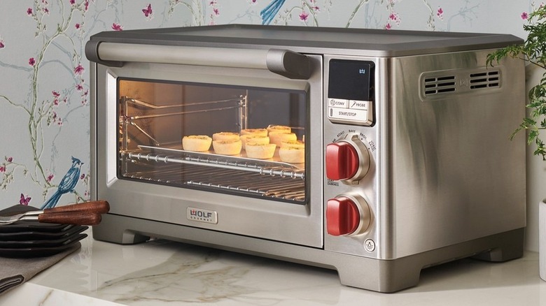 A Wolf Gourmet Countertop Oven sitting in a kitchen