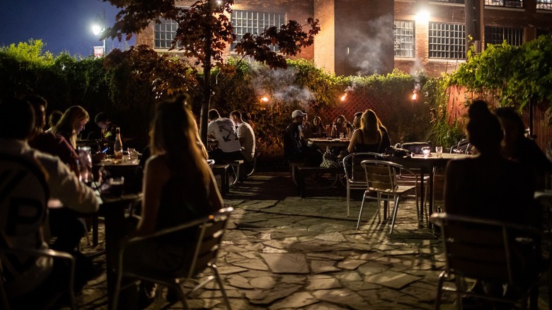 Outdoor patio at MotorCity Wine in the evening