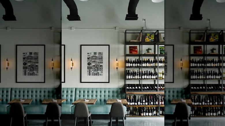 Interior seating and wine shelves at Graft Wine Shop