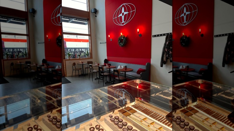 Interior of Flight Wine + Chocolate, including seating and counter with chocolates