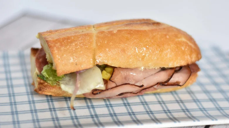 Panera Toasted Italian sandwich on a blue gingham tablecloth